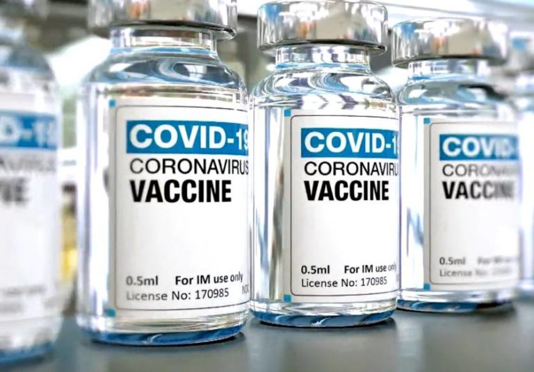 bottles of vaccines labeled as covid-19 coronavirus vaccine