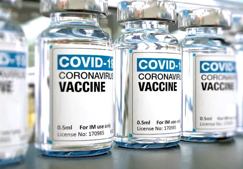 bottles of vaccines labeled as covid-19 coronavirus vaccine